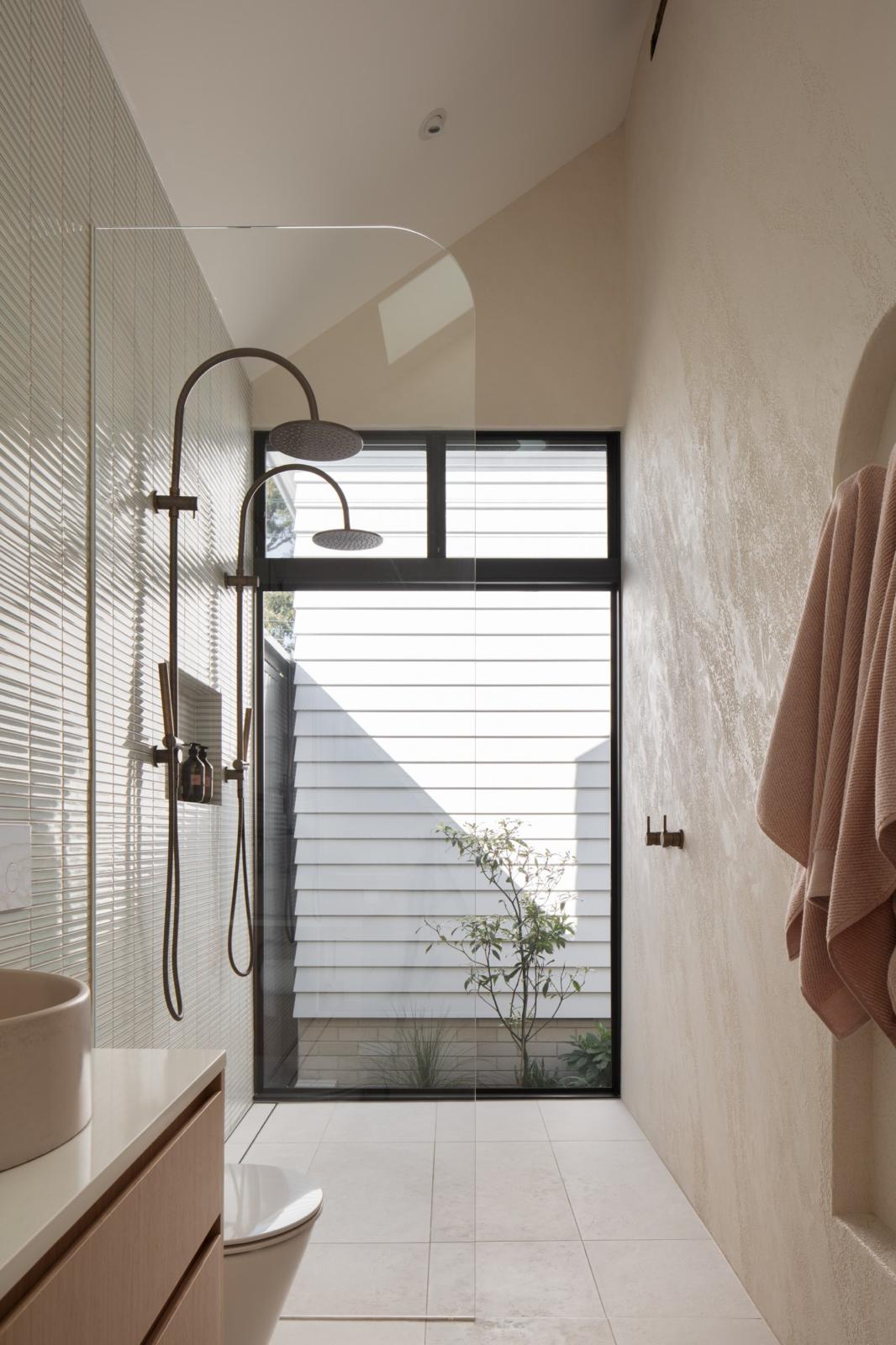 Twin rain showers to courtyard — Bathroom Renovations job in Gerringong by Shellharbour Plumbing