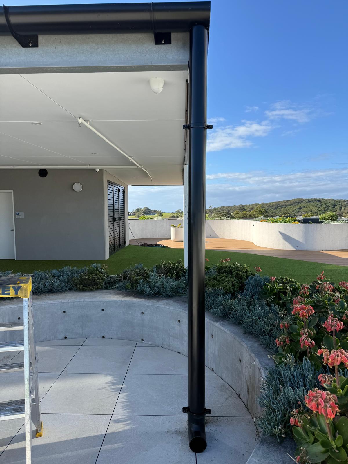 Rooftop terrace — downpipe install — Shell Cove | Shellharbour Plumbing