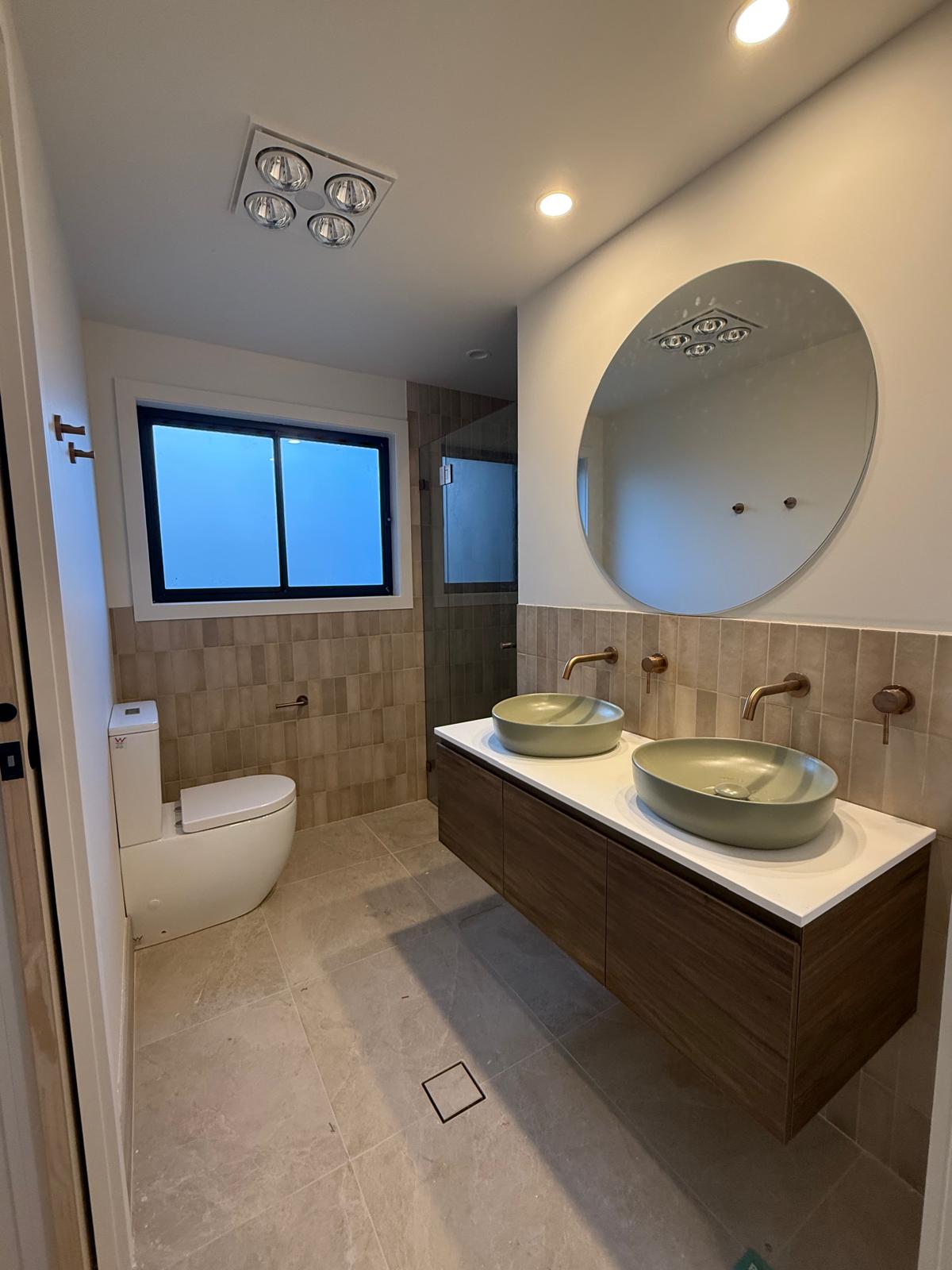 Family bathroom — sage basins & brass — Shellharbour | Shellharbour Plumbing