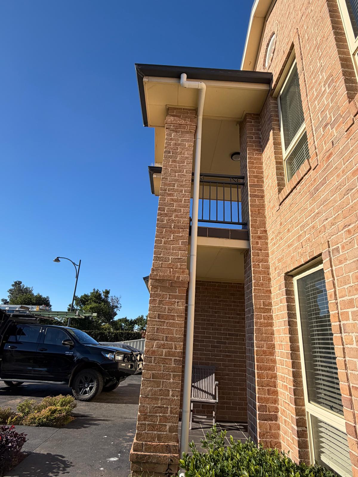 Two-storey downpipe replacement — brick façade — Flinders | Shellharbour Plumbing