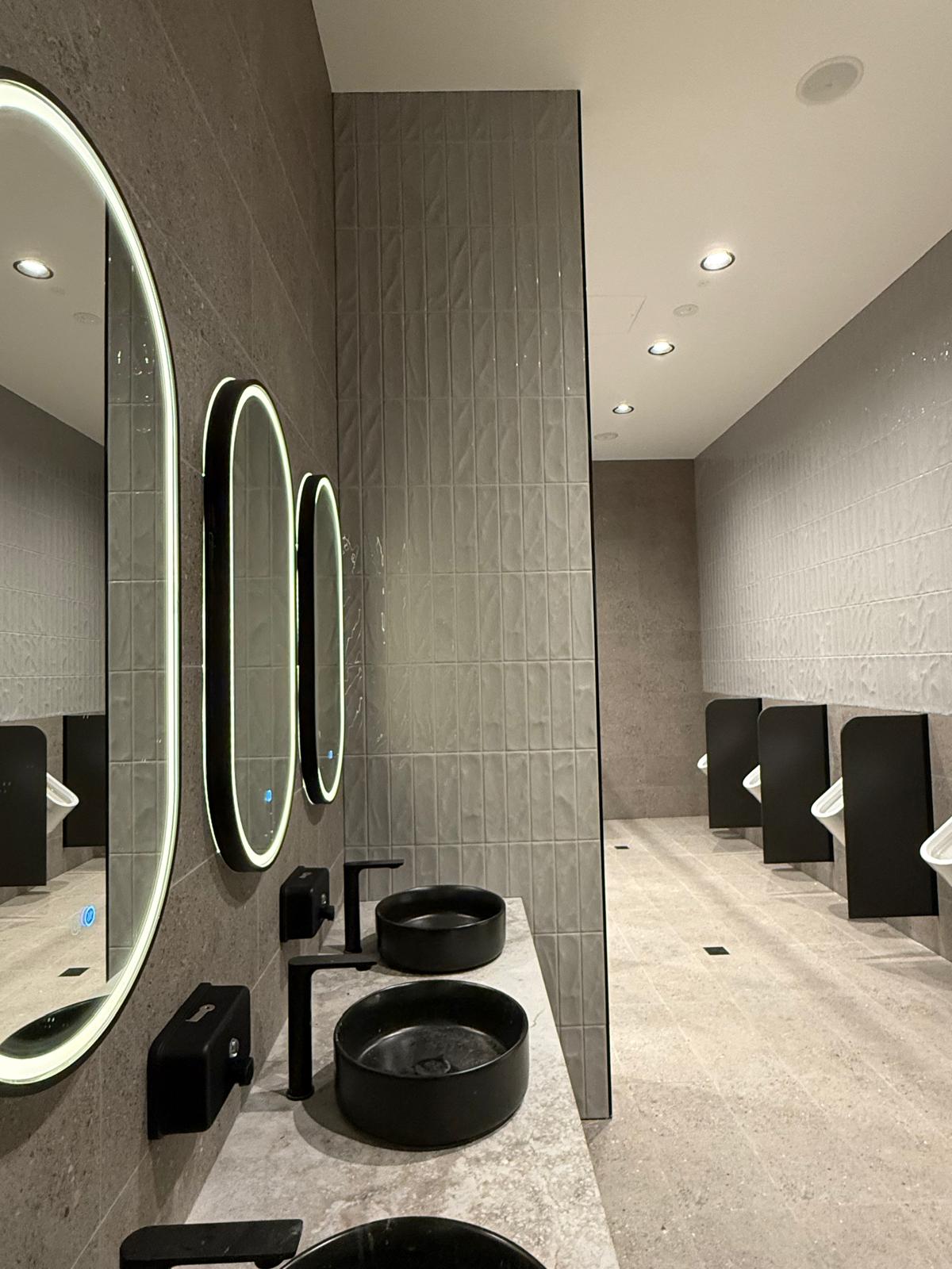Commercial amenities — matte black fit-out — Albion Park | Shellharbour Plumbing