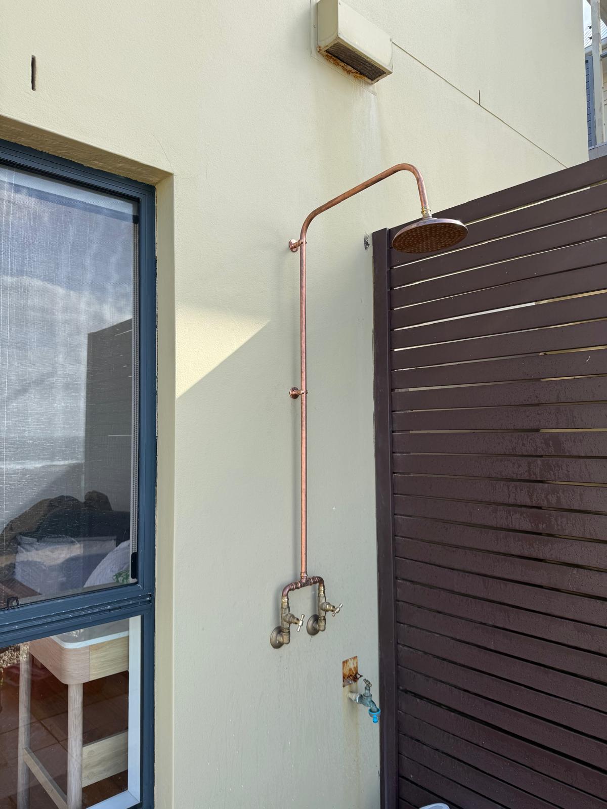 Copper outdoor shower — courtyard side view — Gerringong | Shellharbour Plumbing